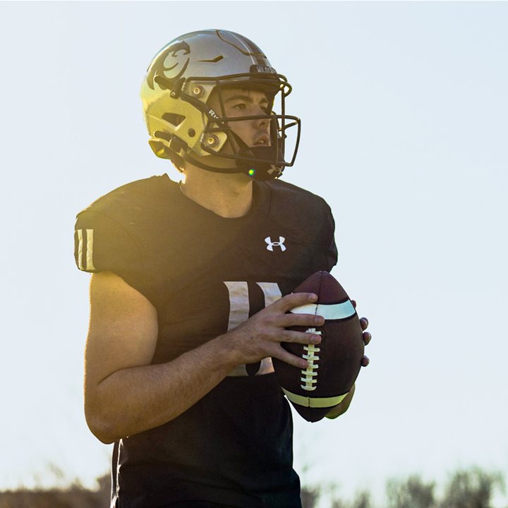 A football player about to make a pass